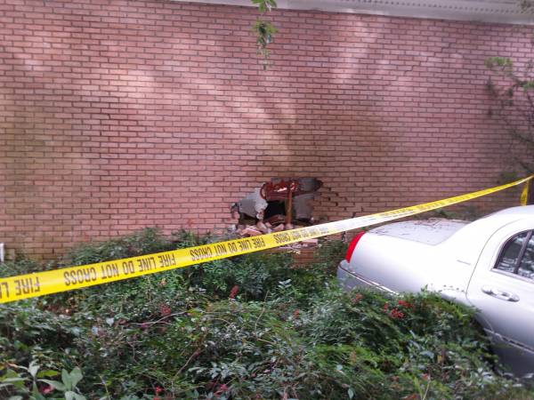 Vehicle vs Building at 2115 West Main