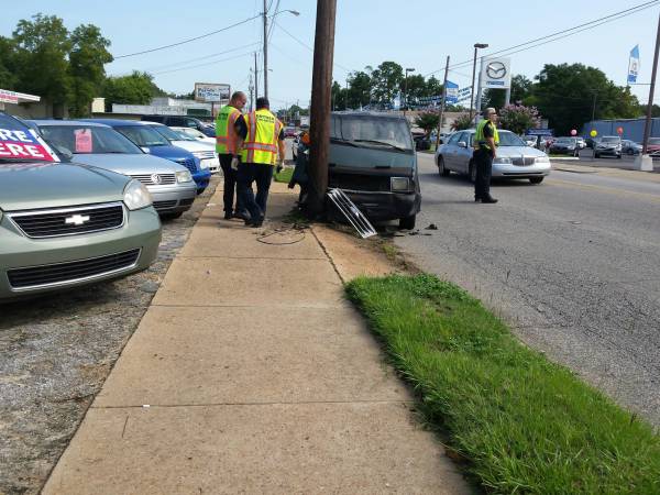 Car vs Two Poles on South Oates