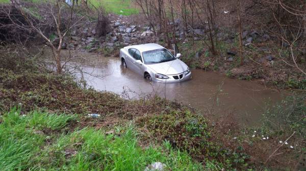 Car in Creek on U S 431