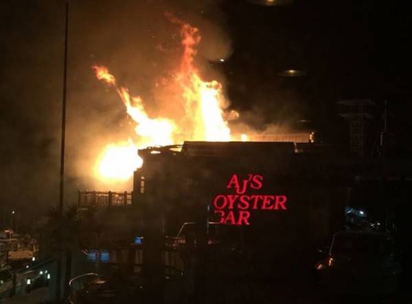 7:30 PM. AJ’s Oyster Bar In Destin Fl On Fire