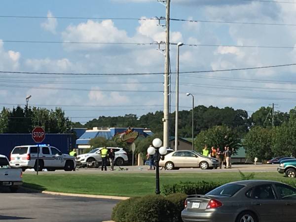 UPDATED @ 5:47 PM.   Motorcycle vs Car on the Boil Weevil Circle and Northpoint Center