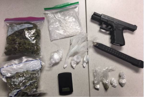 Traffic Stop Leads to Stolen Gun and Bags of Drugs Arrest