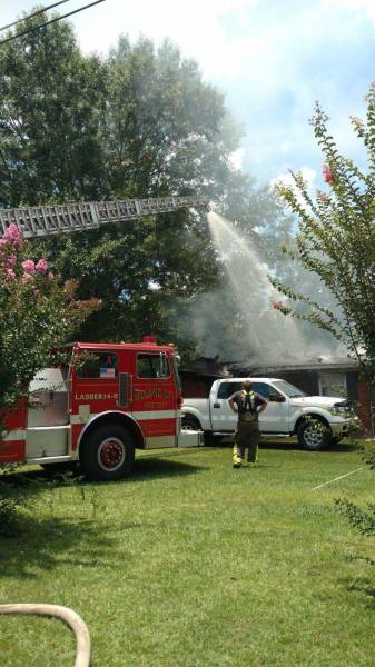 Report of a Structure Fire in Midland City