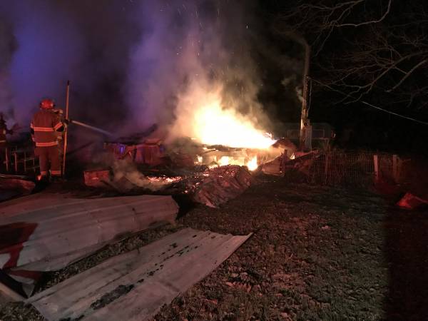 10:48 PM.  Structure Fire Fully Engulfed - On Ground