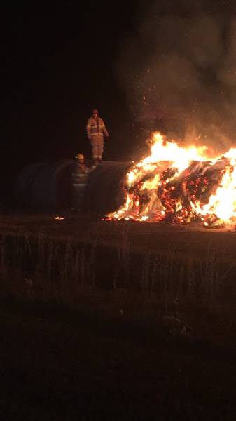 9:01 PM. Pansey Volunteer Fire On Scene With Multiple Hay Bales On Fire