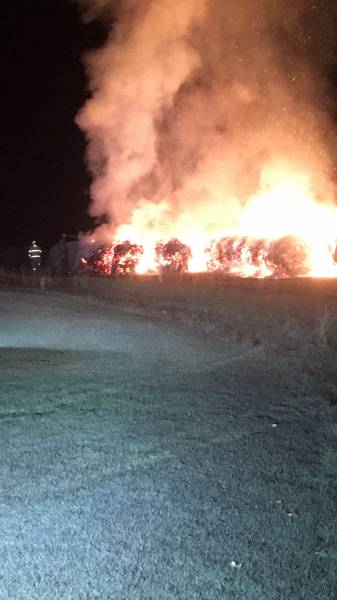 9:01 PM. Pansey Volunteer Fire On Scene With Multiple Hay Bales On Fire