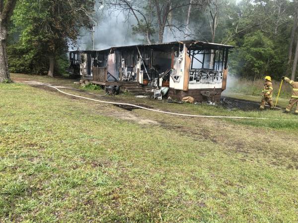 Two Men Passing By Save Man From Burning Mobile Home