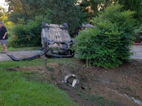 6:17 AM... Vehicle Overturned in Yard at 5625 Eddins Road