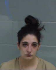 WOMAN ARRESTED ON WARRANT FACING CONTRABAND CHARGE