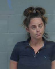 WOMAN ARRESTED AFTER ASSAULTING EMERGENCY PERSONNEL
