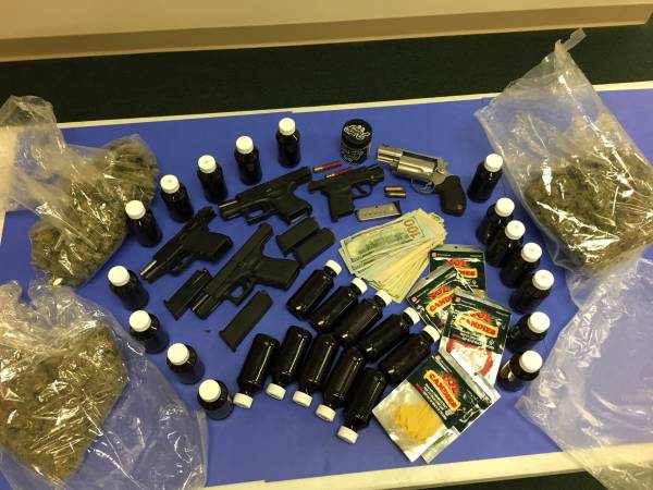 Two Arrested for Marijuana and Multiple Firearms