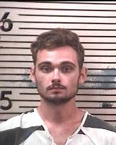 DEFUNIAK SPRINGS MAN CHARGED WITH HEROIN POSSESSION