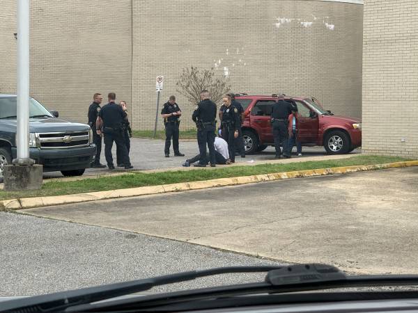 10:39 PM. UPDATED WITH PICTURES.  Fight In The Parking Lot of Dothan Police Docket