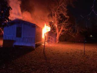 5:21 AM.   Working Structure Fire at Weeks Trailer Park
