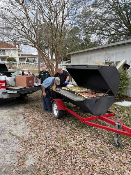 Holmes County Sheriff Prepare food for the Holmes Council