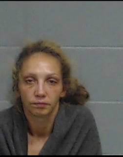 Woman Arrested after Altercation Leads to Shooting