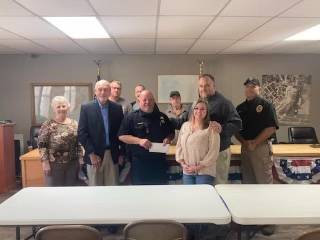 Tim and Johnnie Watson Make Generous Donation To Napier Field Police Department