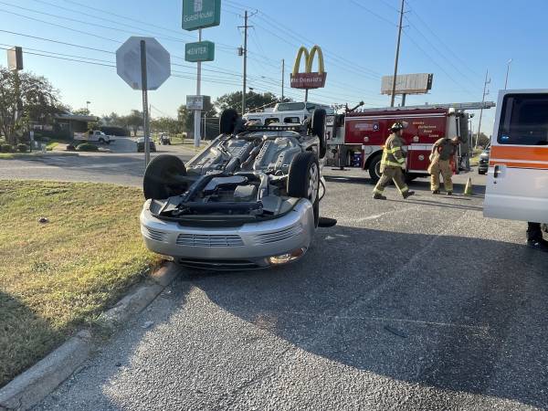 9:05 AM.   Overturned With Entrapment - Ross Clark Circle and Kelly Drive