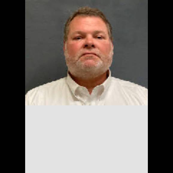 12:43 PM.   Assistant District Attorney Mark Johnson Arrested