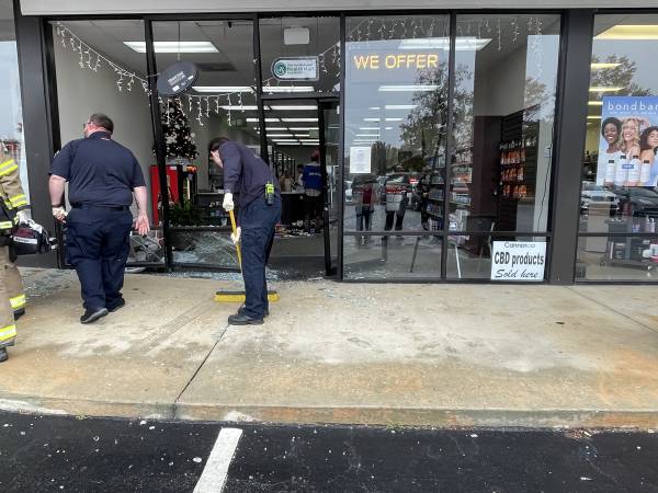 UPDATED @ 5:45 PM.   1:23 PM. Vehicle Drives Into Pharmacy On Inez Road